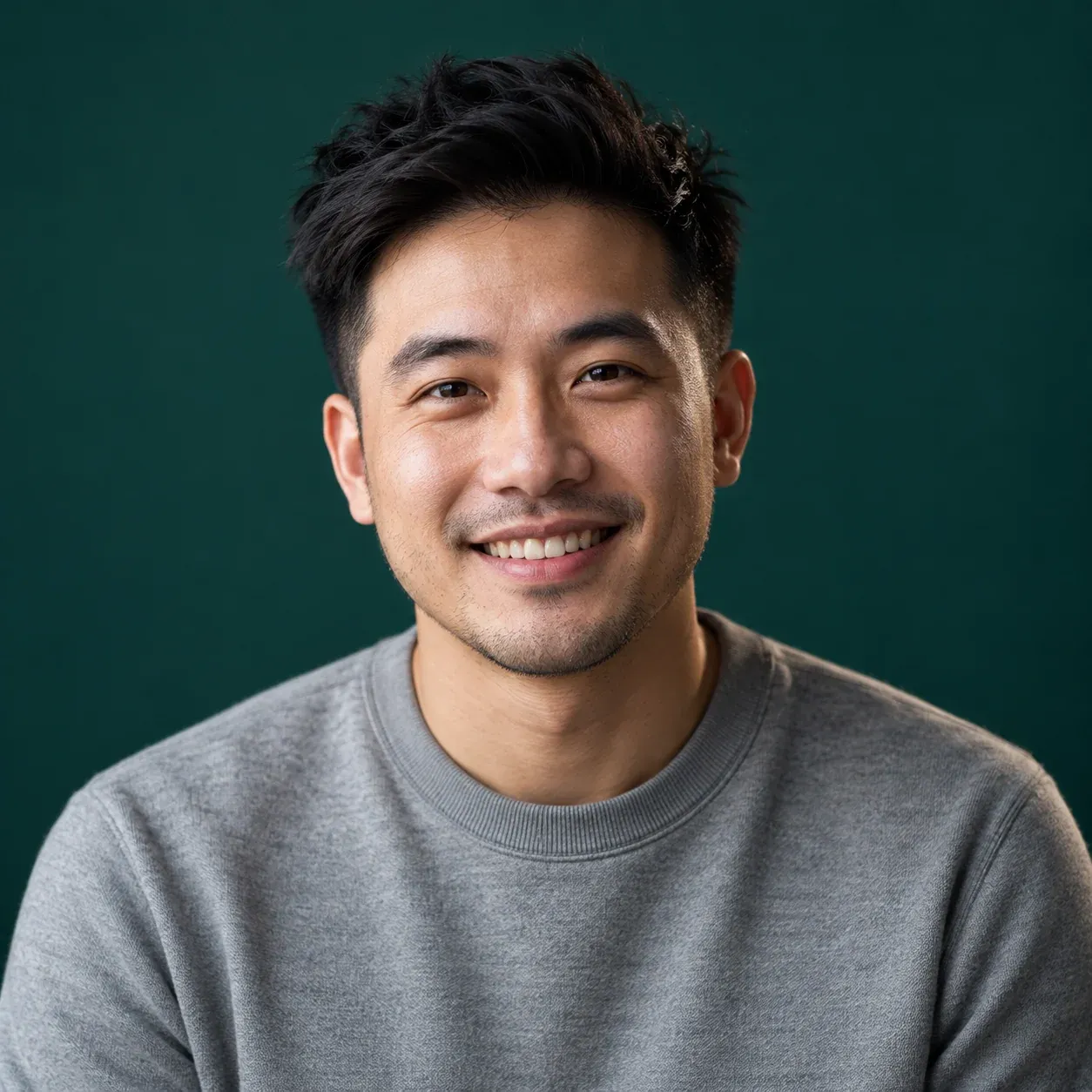 Portrait of Lê Gia Bảo, Head of Growth & Schools at WhereTheFuture, against a deep teal backdrop.